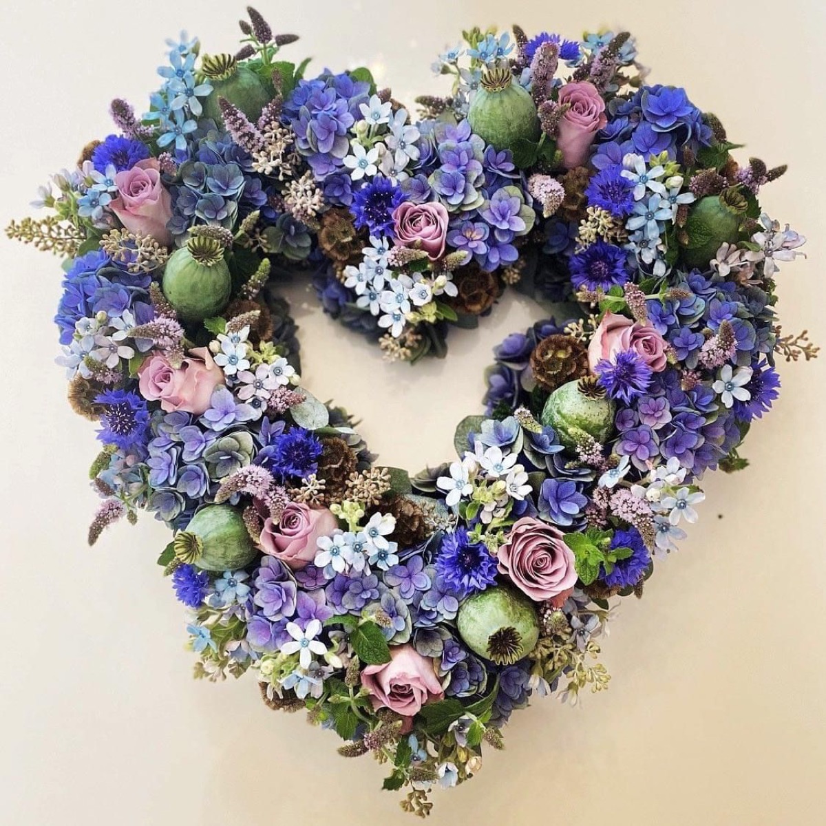 Blue open heart funeral flower tribute